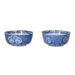 A pair of blue and white porcelain bowls, decorated with flowers. Marked with 4-character mark.