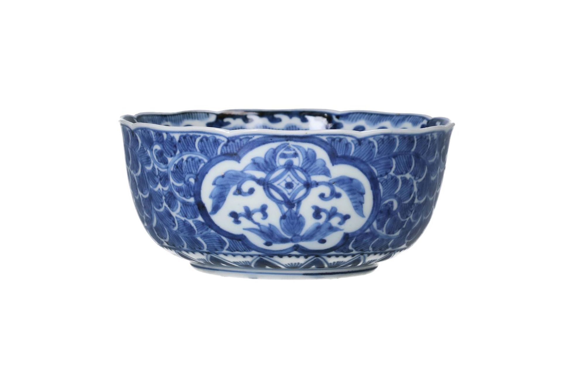 A pair of blue and white porcelain bowls, decorated with flowers. Marked with 4-character mark. - Image 3 of 7