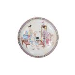 A famille rose porcelain deep plate with a decoration of figures, the reverse covered in ruby-pink