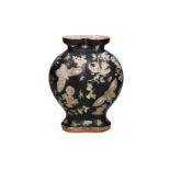 A famille noir porcelain vase in a double body shape with a relief decoration of pomegranates,