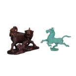 Lot of two sculptures, 1) a carved soapstone sculpture depicting a qilin with cub. Unmarked.