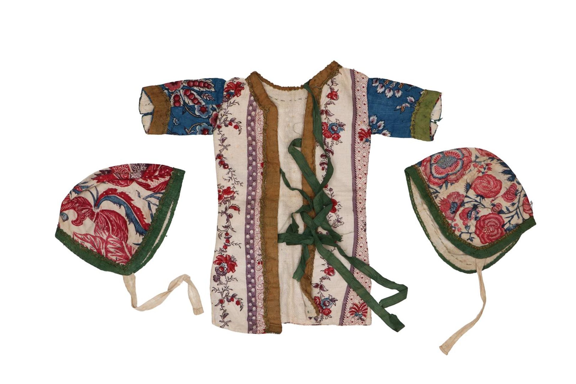 A set of Chintz, woodblock printed baby clothes consisting of a jacket and two hats. The