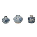 Lot of three blue and white porcelain vases, decorated with deer, horses and peaches. Unmarked.