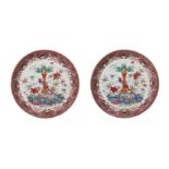 A pair of two famille rose porcelain deep dishes, decorated with antiquities and flowers. Marked