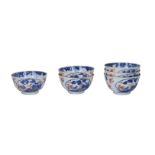 A set of six blue, white and red porcelain cups, decorated with birds and flowers. Unmarked.