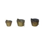Lot of three nested cup-weights: 1 )A nested cup-weight, ½ pound, Germany, before 1871. Denomination