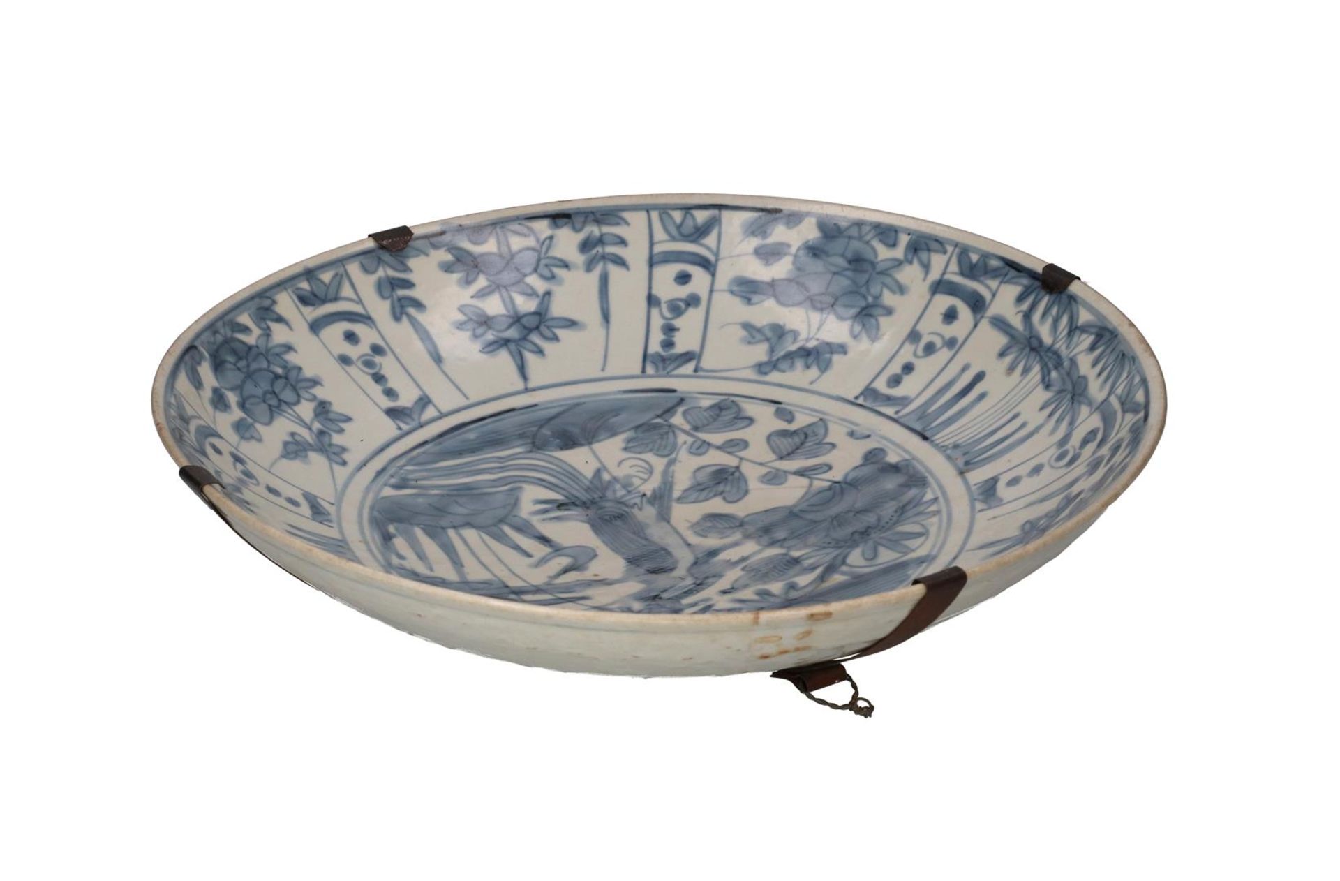 A blue and white porcelain deep charger, decorated with flowers and a water bird. Unmarked. China, - Image 3 of 4