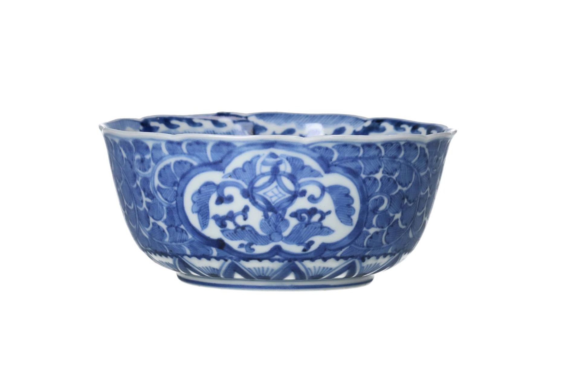 A pair of blue and white porcelain bowls, decorated with flowers. Marked with 4-character mark. - Image 2 of 7