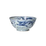 A blue and white porcelain bowl, decorated with dragons chasing a flaming pearl. Unmarked. China,