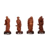 Lot of four carved boxwood figures on a base, depicting four of the eight immortals. China, 20th