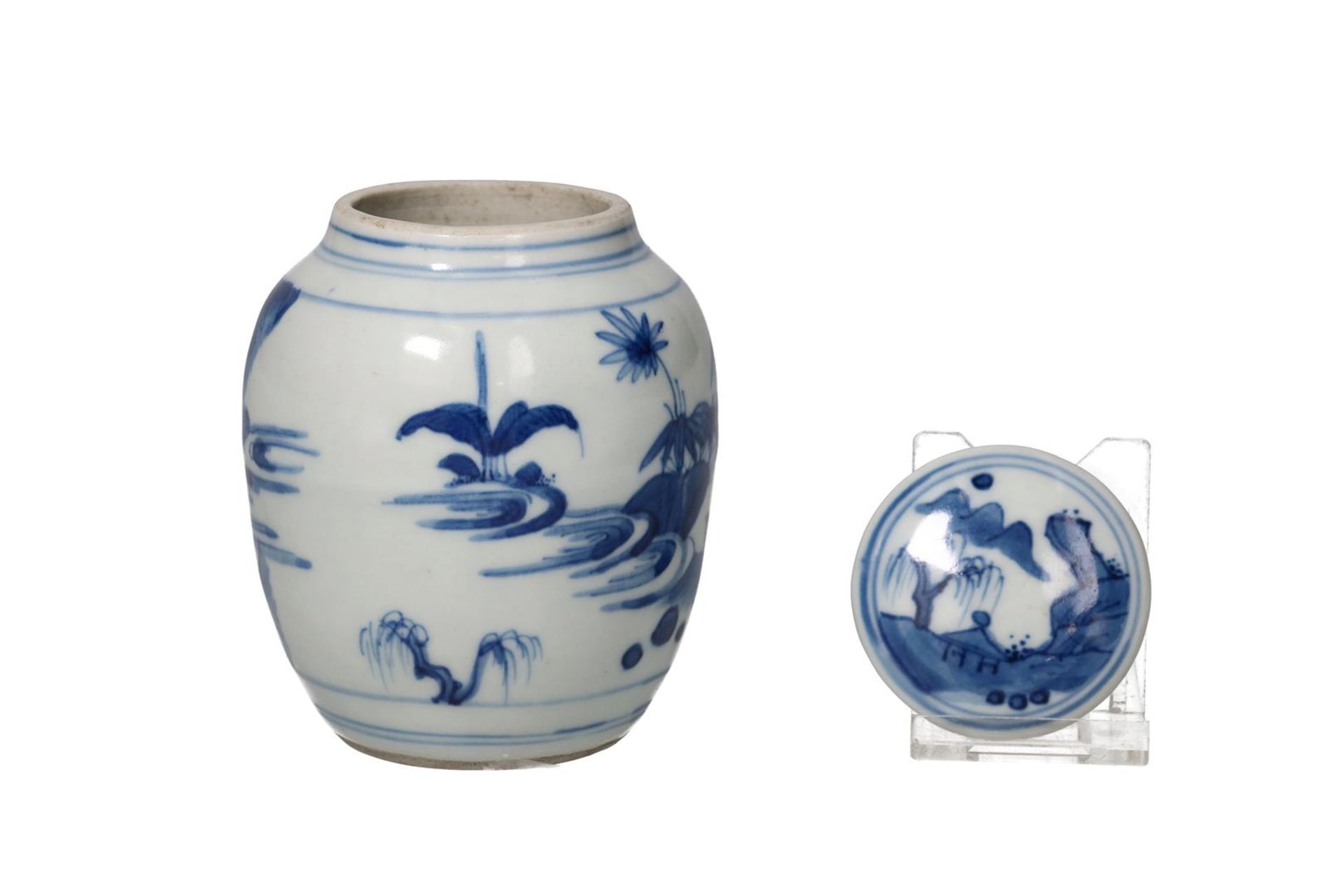 A blue and white porcelain jar with lid, decorated with a landscape with figures. Unmarked. China, - Image 2 of 6