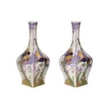 A pair of polychrome eggshell vases with a decoration of pansies. Painted by Samuel Schellink,