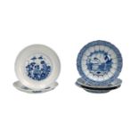Lot of five blue and white porcelain saucers, two with a floral decoration and three with an
