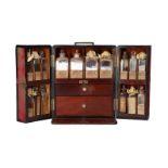 A mahogany doctor's travel pharmacy, with 20 original neck-cut bottles with cut stoppers (in