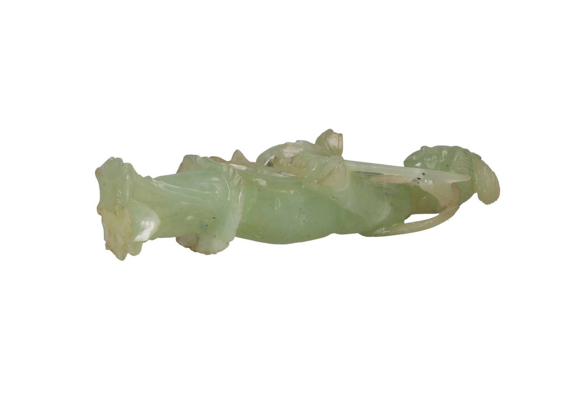 A carved jade sculpture of a woman holding valuables. China, 20th century. H. 15.5 cm. Condition - Image 4 of 4
