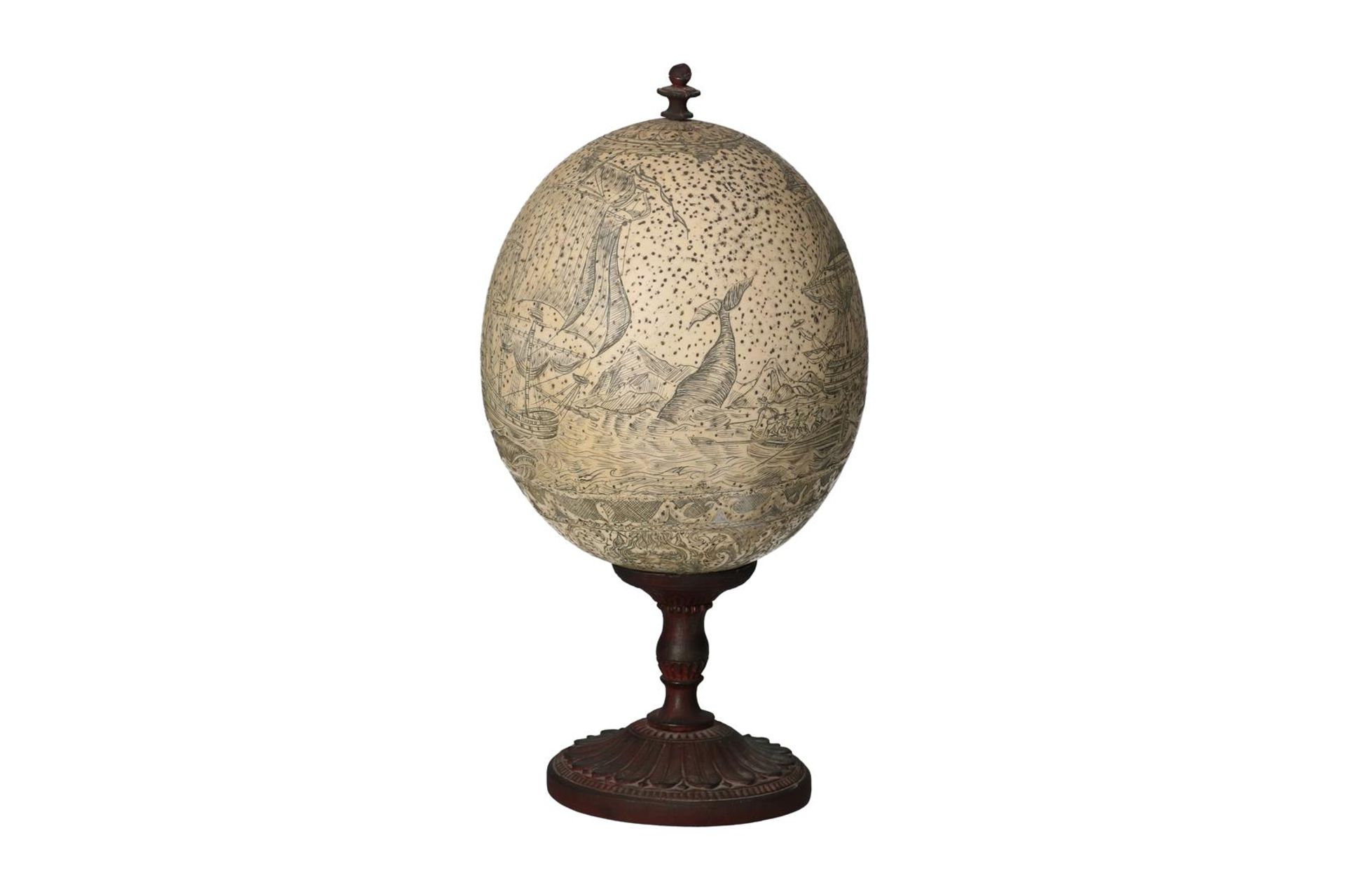 A carved ostrich egg on metal base, depicting the whale hunt. 19th century. H. 22.5 cm. Condition - Image 2 of 6