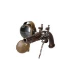 A flintlock pistol with two locks and side mounted candle lamp. One of the great 'arquebusier' of