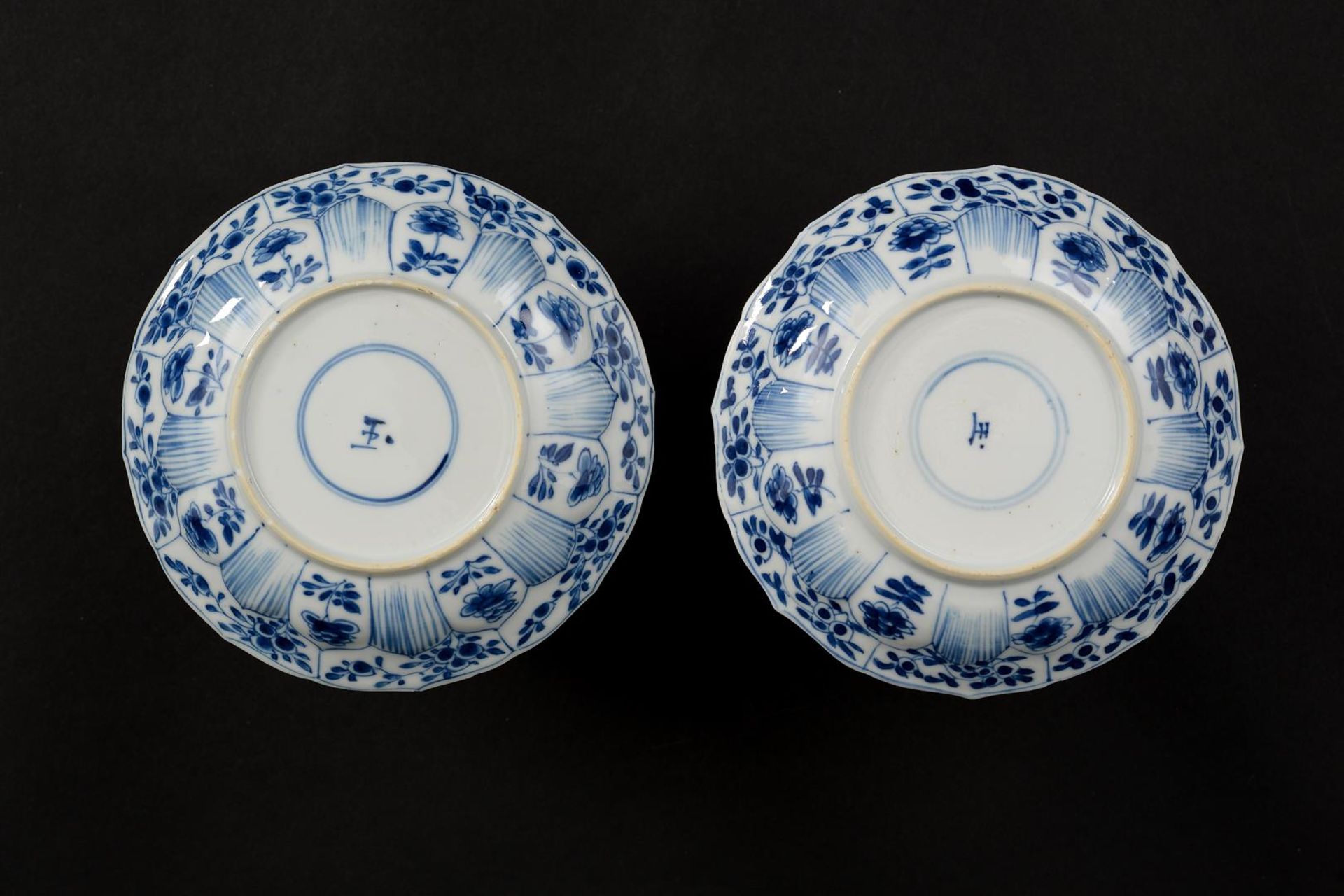 A set of six blue and white porcelain cups and saucers with a decoration of lotus in relief and a - Image 3 of 8