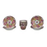 A set of six famille rose porcelain cups and saucers, decorated with flowers. Unmarked. China,