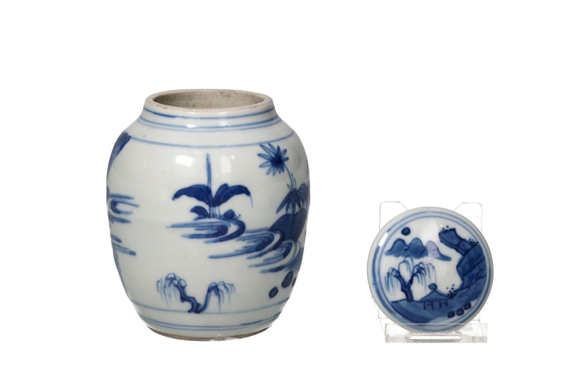 A blue and white porcelain jar with lid, decorated with a landscape with figures. Unmarked. China, - Image 3 of 6