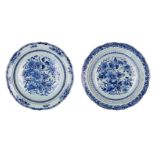 A pair of blue and white porcelain strainer dishes (without strainers) with scalloped rim, decorated