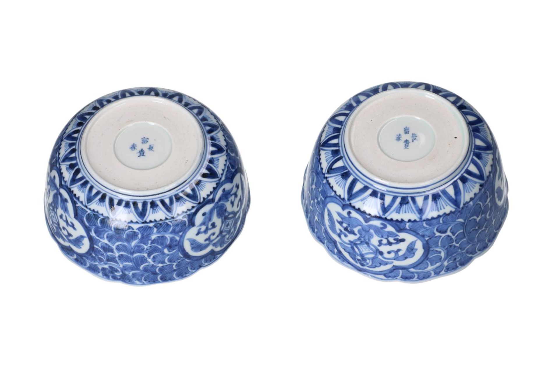 A pair of blue and white porcelain bowls, decorated with flowers. Marked with 4-character mark. - Image 7 of 7
