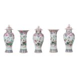 A five-piece famille rose porcelain garniture, decorated with flowers and antiquities. Unmarked.