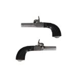 A pair of percussion boxlock muff pistols with screw off barrels. System scroll engraved. Rifled