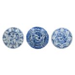 Lot of three blue and white porcelain objects, 1) deep dish, decorated with fruits and deer. 2) deep