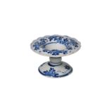 A blue and white porcelain salt cellar, with a floral decoration. Unmarked. China, Kangxi.