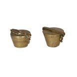 Lot of two nested cup-weights: 1) A Nuremberg nested cup-weight, 1 Amsterdam pound, 1778. Master