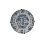 A blue and white porcelain deep charger, decorated with flowers and a water bird. Unmarked. China,