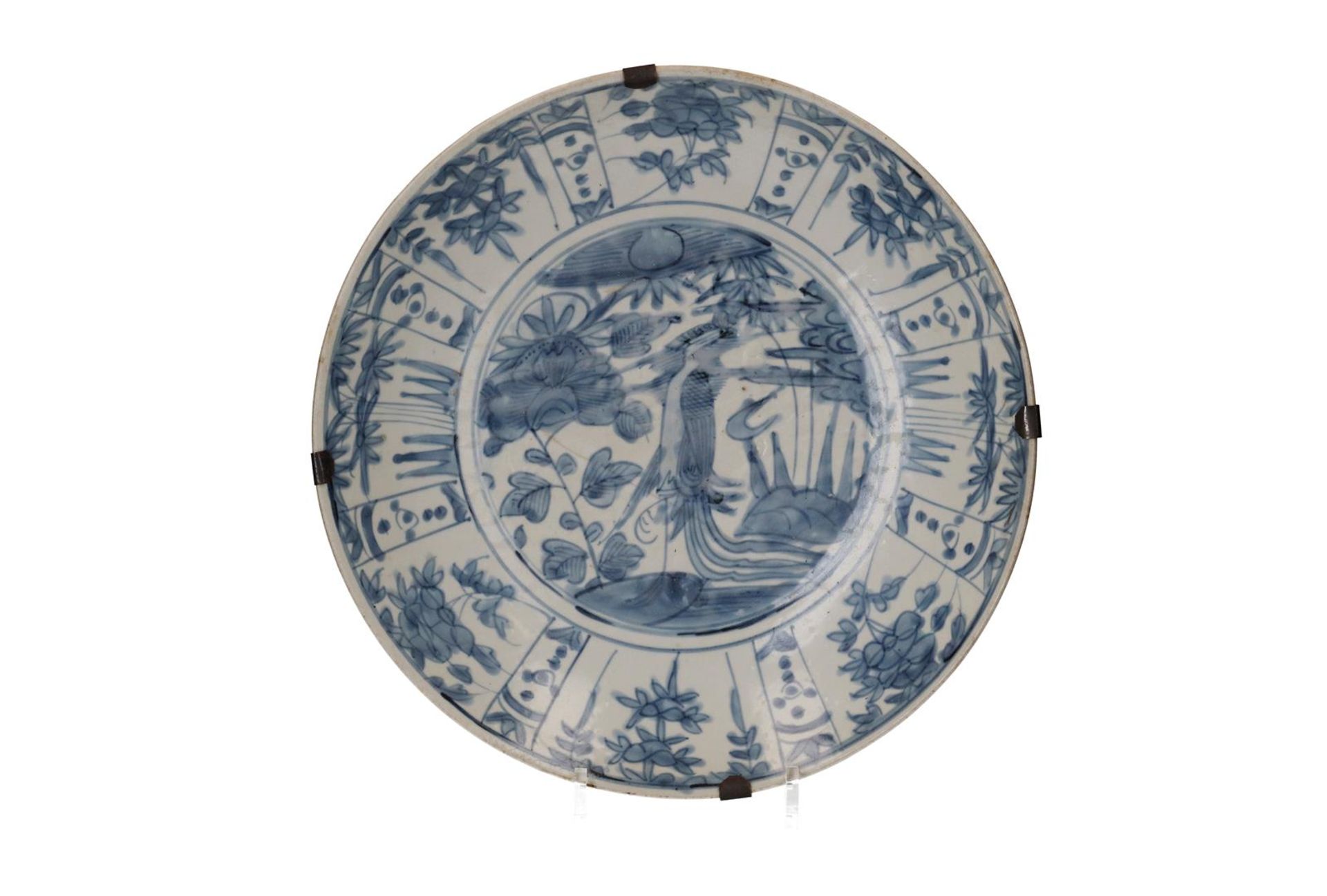 A blue and white porcelain deep charger, decorated with flowers and a water bird. Unmarked. China,