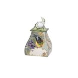 A polychrome eggshell porcelain lidded box decorated with a bird, yellow and purple orchids. Painted