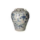 A blue and white Swatow porcelain martaban jar with four grips, decorated with flowers and
