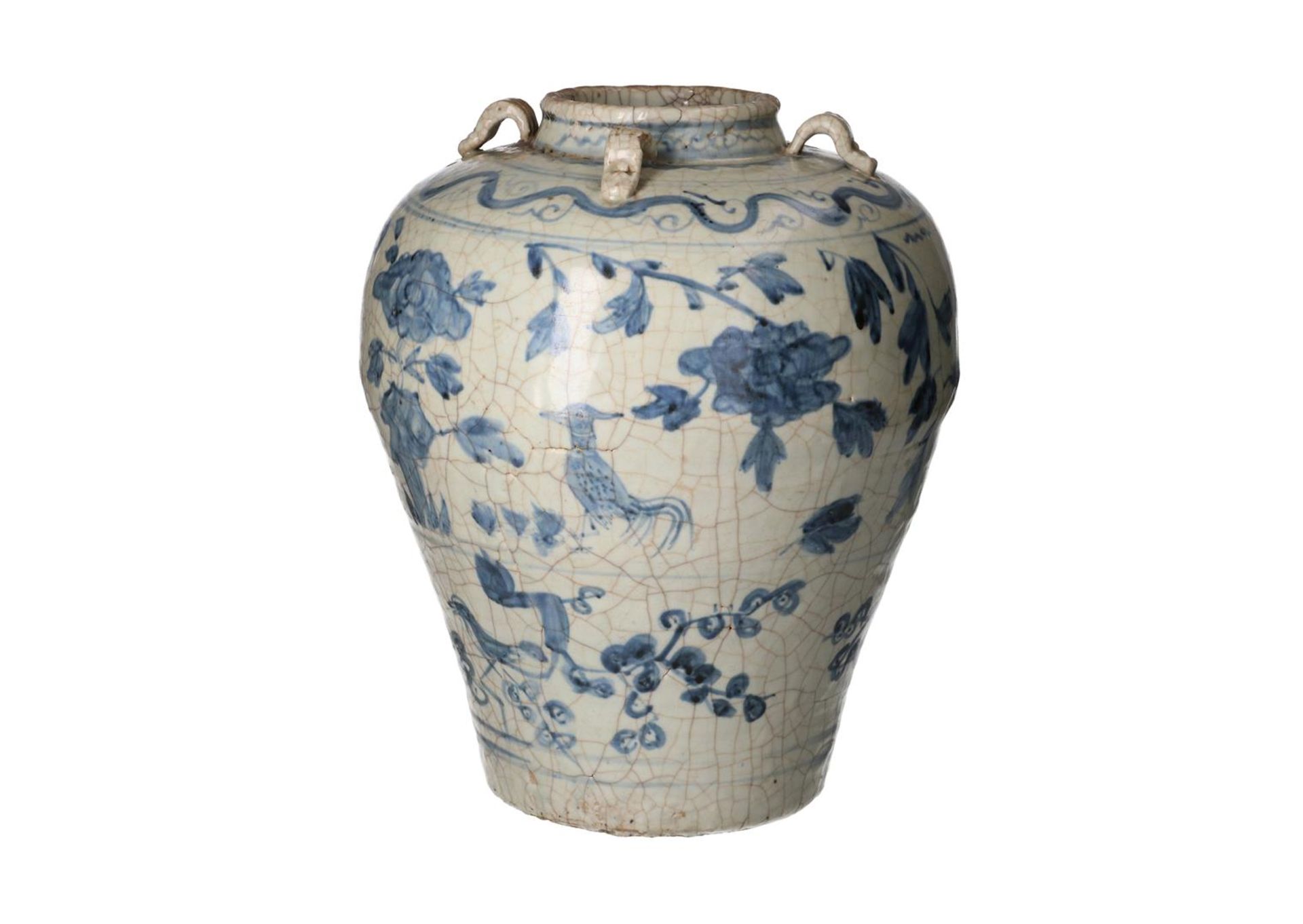 A blue and white Swatow porcelain martaban jar with four grips, decorated with flowers and