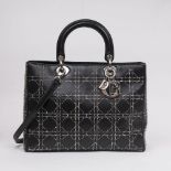 Christian Dior. Lady Dior Bag Schwarz mit Nieten.