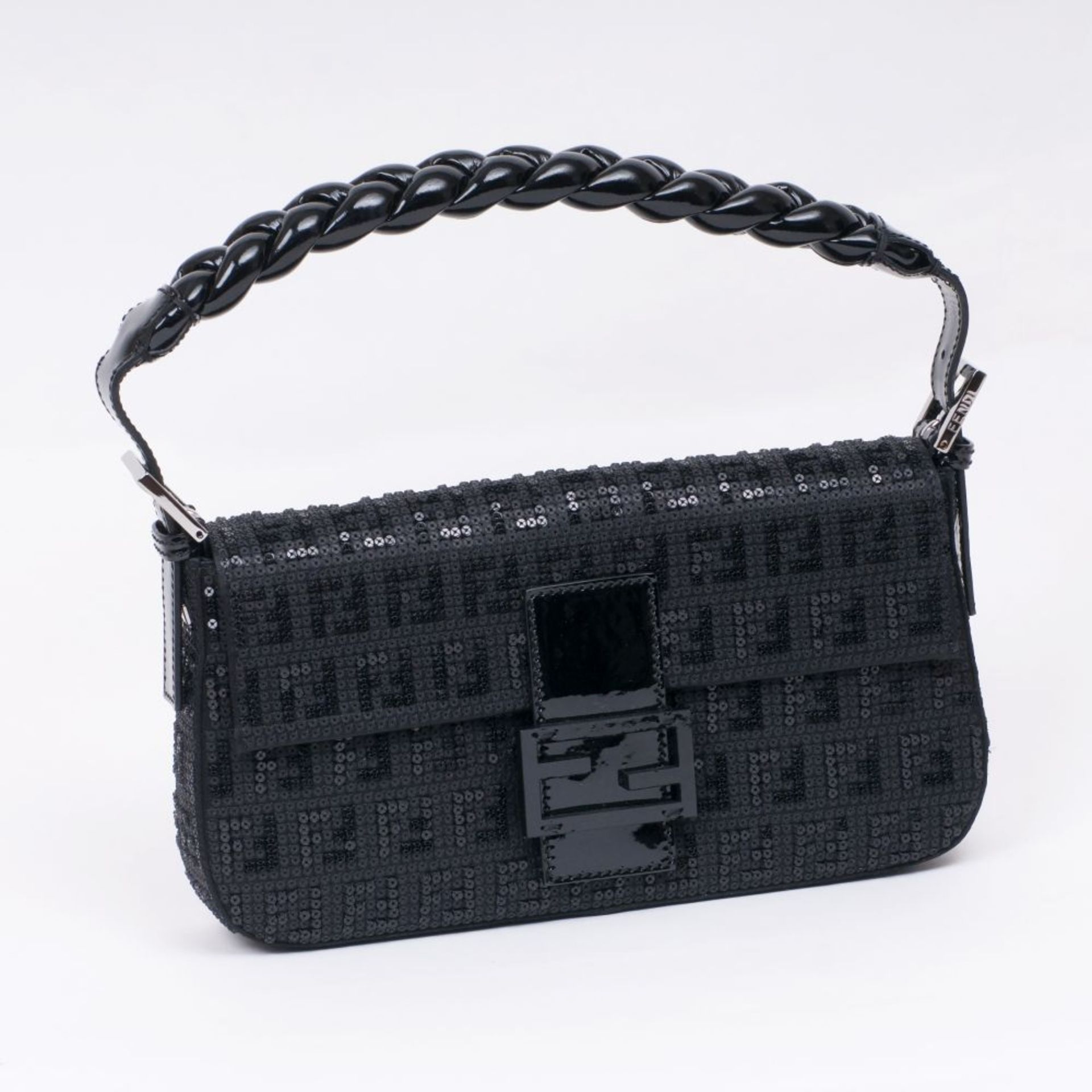 Fendi. Baguette mit schwarzen Pailletten.