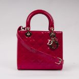 Christian Dior. Lady Dior Bag Kirschrot.