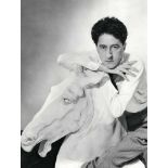 GEORGE HOYNINGEN-HUENE - The Poet Jean Cocteau on a Plaster Horse - Original vintage photogravure