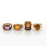 A MISCELLANEOUS GROUP OF FOUR GEM-SET RINGS