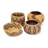 A COLLECTION OF FOUR VINTAGE ZULU ILALA PALM BASKETS, HLABISA, NORTHERN ZULULAND