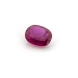 AN UNMOUNTED OVAL MIXED-CUT RUBY