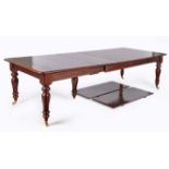 A MAHOGANY EXTENDING DINING TABLE, 19TH CENTURY