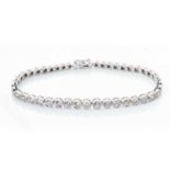 A DIAMOND TENNIS BRACELET