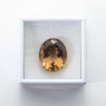 AN UNMOUNTED OVAL MIXED-CUT CITRINE