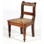 A CAPE STINKWOOD REGENCY CHILD'S CHAIR