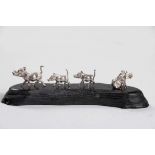 A CAST SILVER GROUP OF WARTHOGS, PATRICK MAVROS
