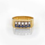 A DIAMOND AND SAPPHIRE RING