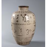 A CHINESE STONEWARE CIZHOU STORAGE JAR, MING DYNASTY, 1368 - 1644